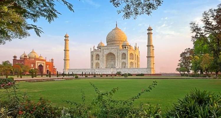 Taj Mahal garden view during sunset.