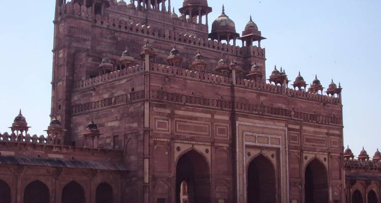 Gate of a historic monument with domed towers.