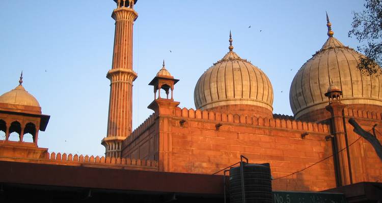 Side view of Jama Masjid at sunset.