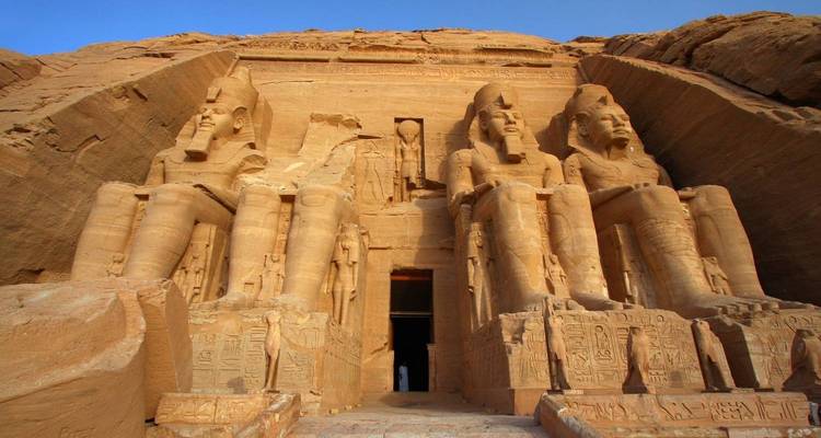 Facade of the Great Temple of Abu Simbel with giant statues.