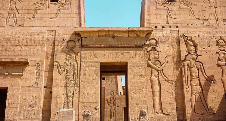 Carved stone facade with detailed engravings.