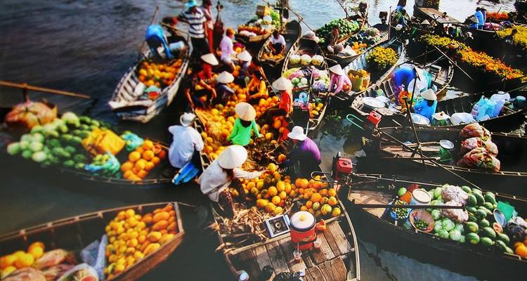 Colorful floating market viewed from above.