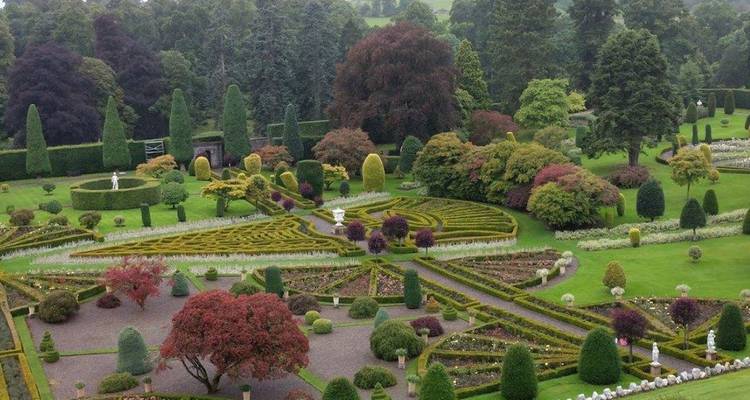 Beautifully manicured gardens with a variety of colorful plants.