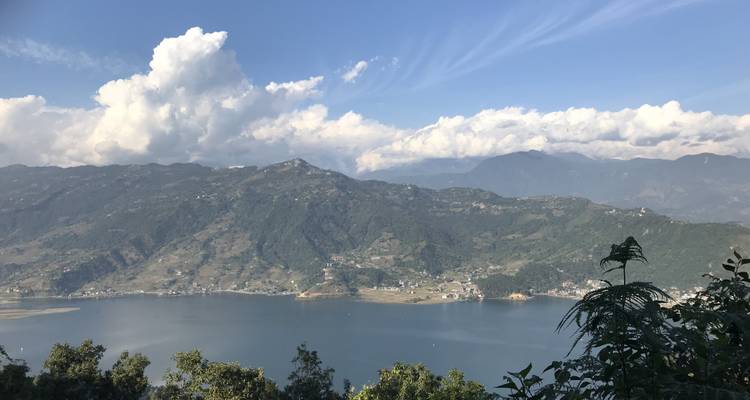 View of a lake surrounded by mountains.