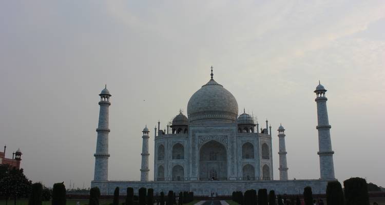 The Taj Mahal with a cloudy sky.