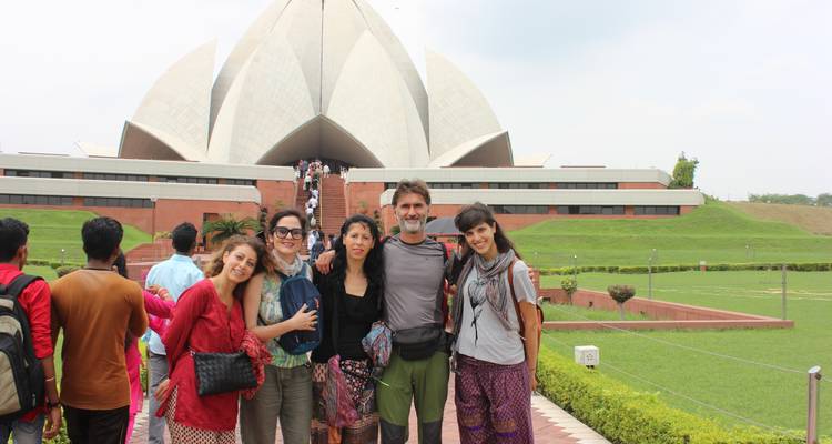 Group of people in front of the Lotus Temple.