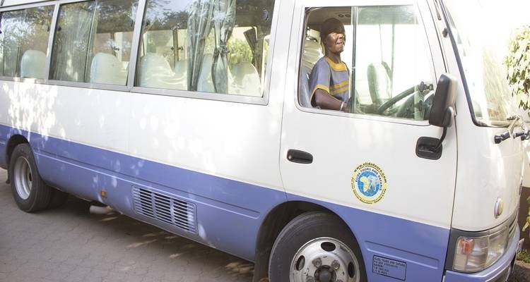 Driver in a minibus, waiting.
