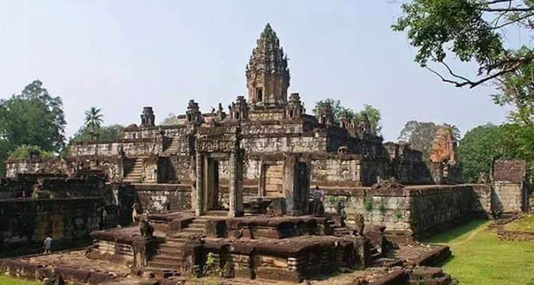 An ancient stone temple, likely part of the Angkor Wat complex in Cambodia.