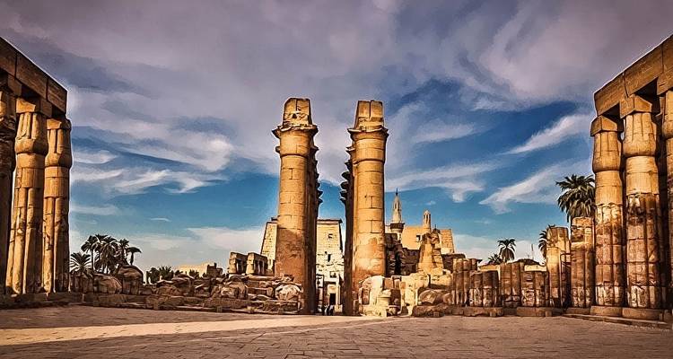 Luxor Temple with ruins and a blue sky.