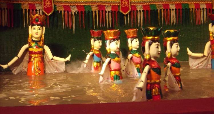 Puppets performing in a traditional water puppet show.