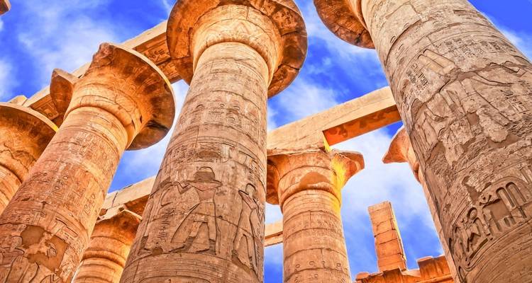 Close-up of ancient columns with intricate carvings.