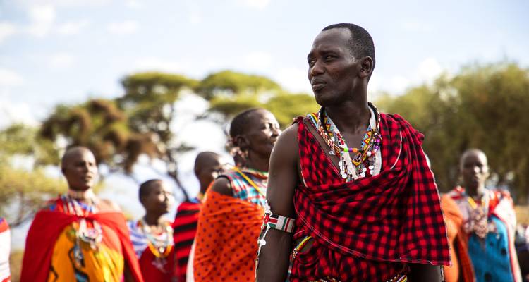 Group of people wearing traditional attire.