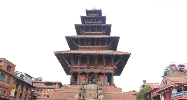 A traditional temple with tiered roofs.