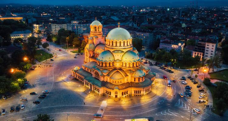 Alexander Nevsky Cathedral lit up at night.