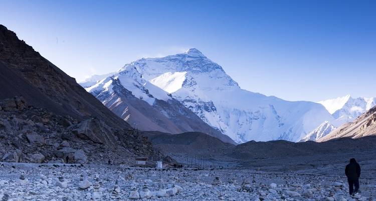 Majestic snowy mountain under a clear blue sky.