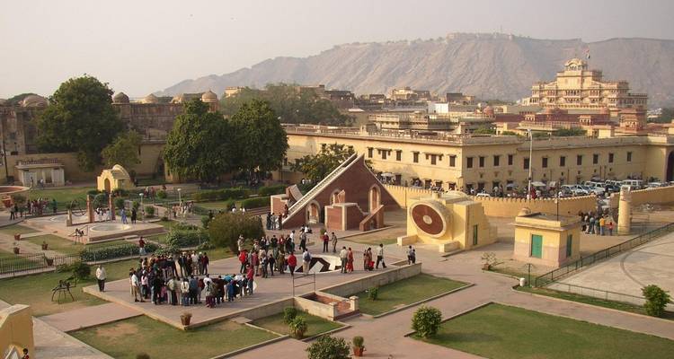 Tourists gathered at an observatory garden.