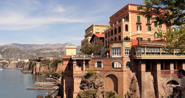Cliffside buildings overlooking the sea in Sorrento, Italy.