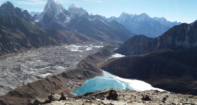 Stunning view of turquoise lakes surrounded by snow-capped mountains.