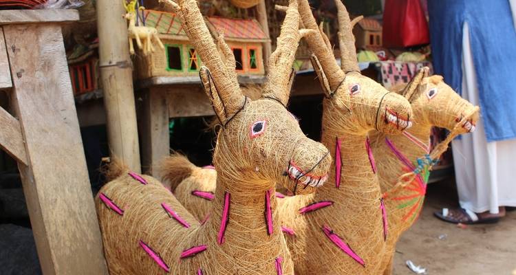 Handcrafted animal figures made from fiber.