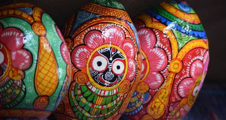 Colorful traditional artwork on decorative items.