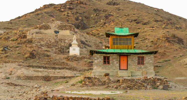Temple and ruins in a rocky landscape