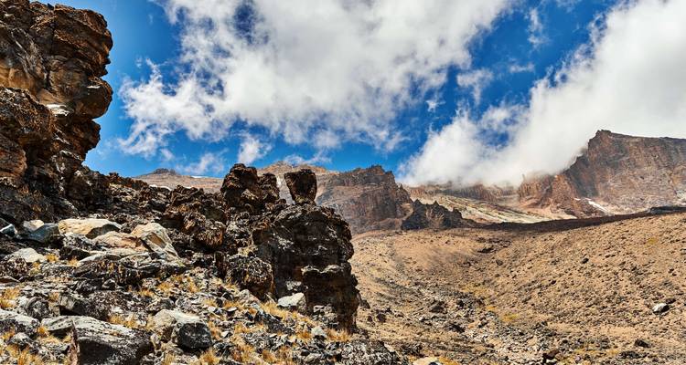 Rocky mountain landscape with a clear blue sky.