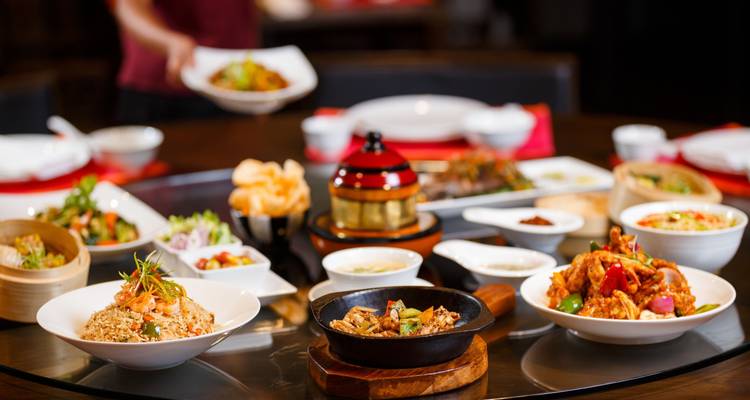Assorted dishes arranged on a dining table.