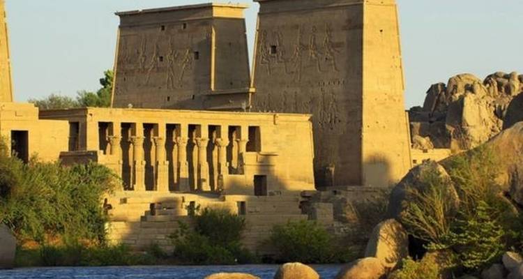 Ancient temple with engraved walls, possibly Philae Temple.