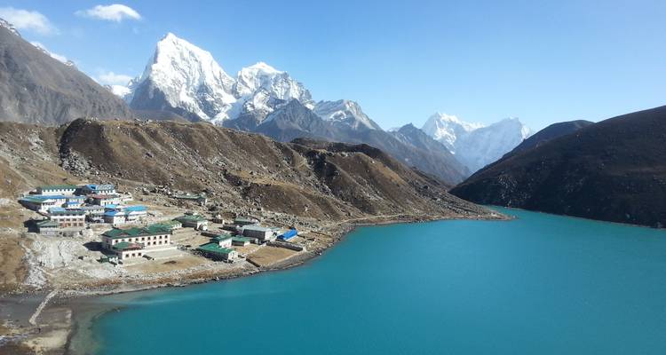 Gokyo village and lake with towering peaks in the background.