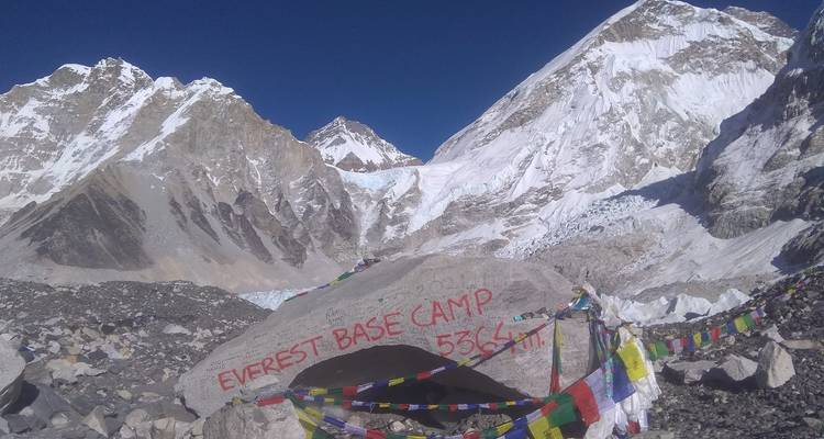 Everest Base Camp with view of snowy peaks.