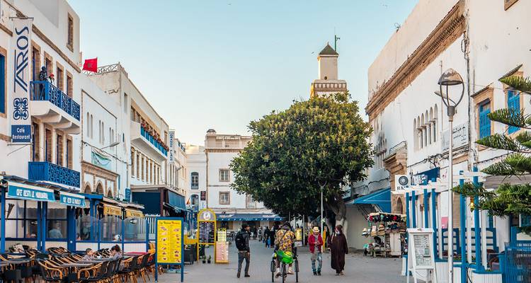 Lively street with buildings and people