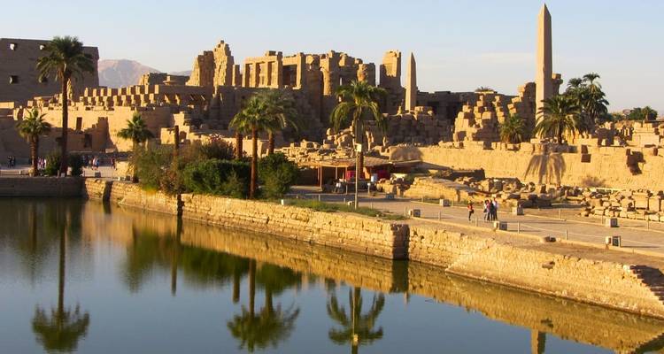 Ancient temple ruins with reflection in the water.
