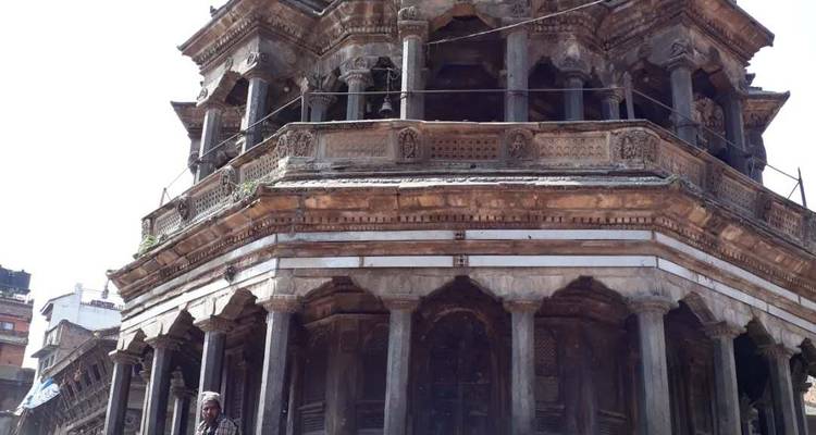 Ancient stone temple with detailed carvings.