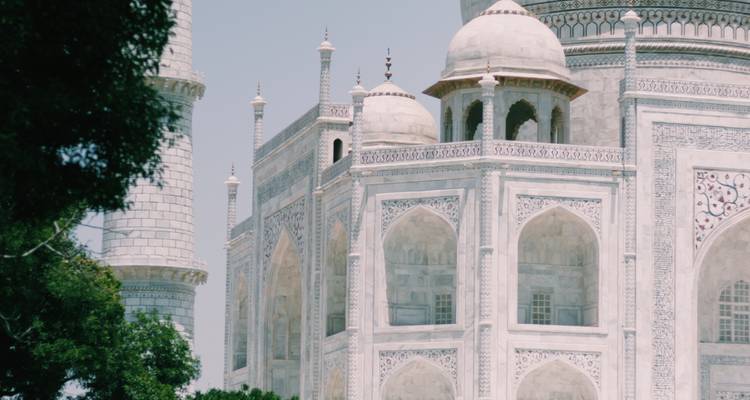 Close-up of the detailed architecture of the Taj Mahal.