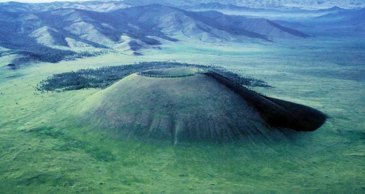 Volcanic landscape with a prominent crater.