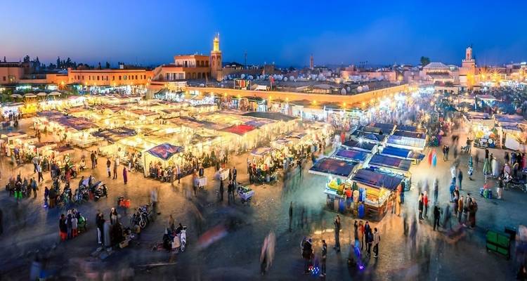 Market scene in Marrakesh at twilight.