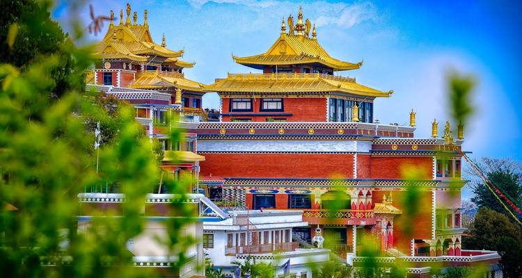 Colorful Buddhist monastery with ornate architecture.