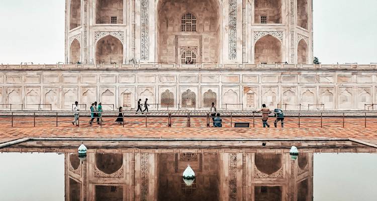 Close-up of the Taj Mahal with reflections.