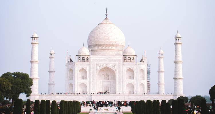 Front view of the Taj Mahal with visitors.