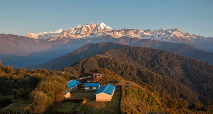 Panoramic view of mountain range at sunrise