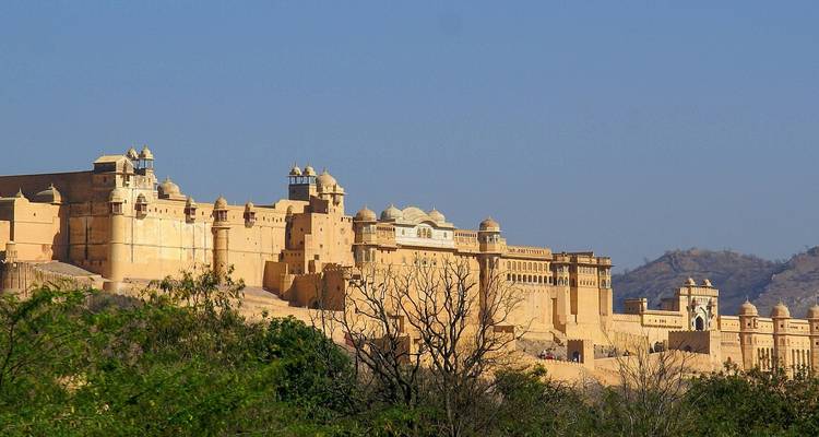 View of Amber Fort's extensive stone walls and towers.