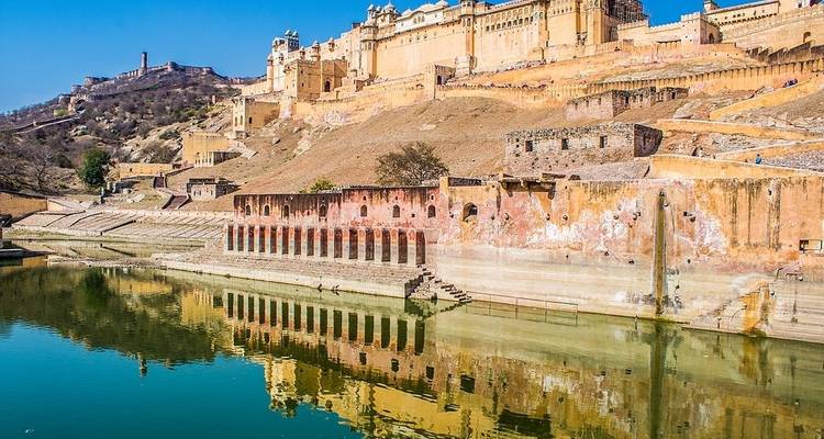 Amber Fort with reflections in the water below.