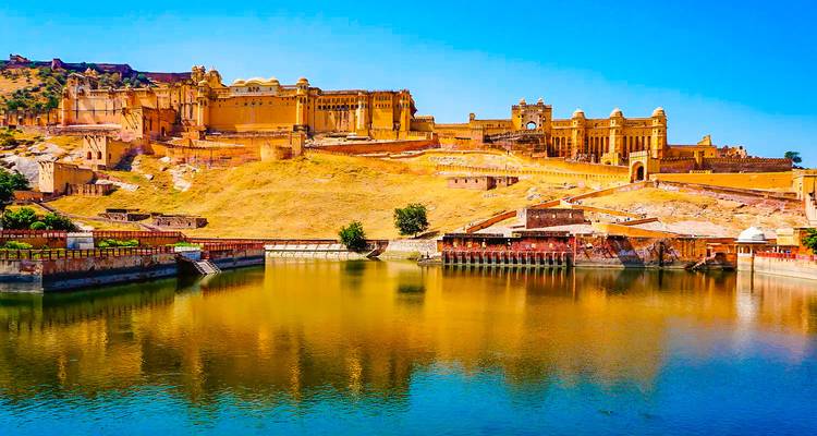 Amber Fort overlooking a reflective lake.