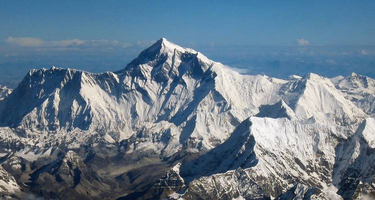Distant view of Mount Everest and surrounding peaks.