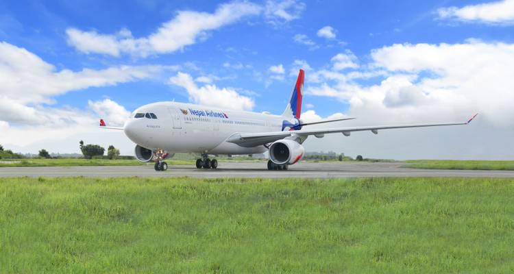 A Nepal Airlines airplane on a runway.