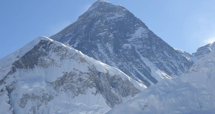Majestic snowy mountain peaks with clear sky.