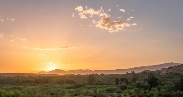 Marrakech landscape at sunset with mountains.