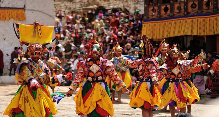 Traditional festival with people in brightly colored costumes.