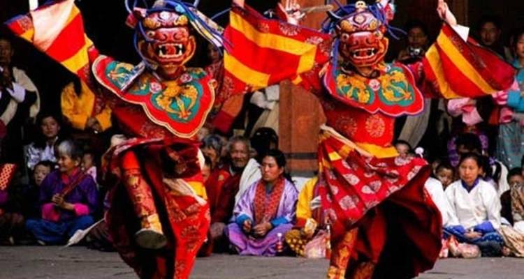 Performers in traditional attire during a cultural festival.