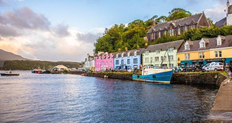 Colorful houses by the waterfront in a quaint village.